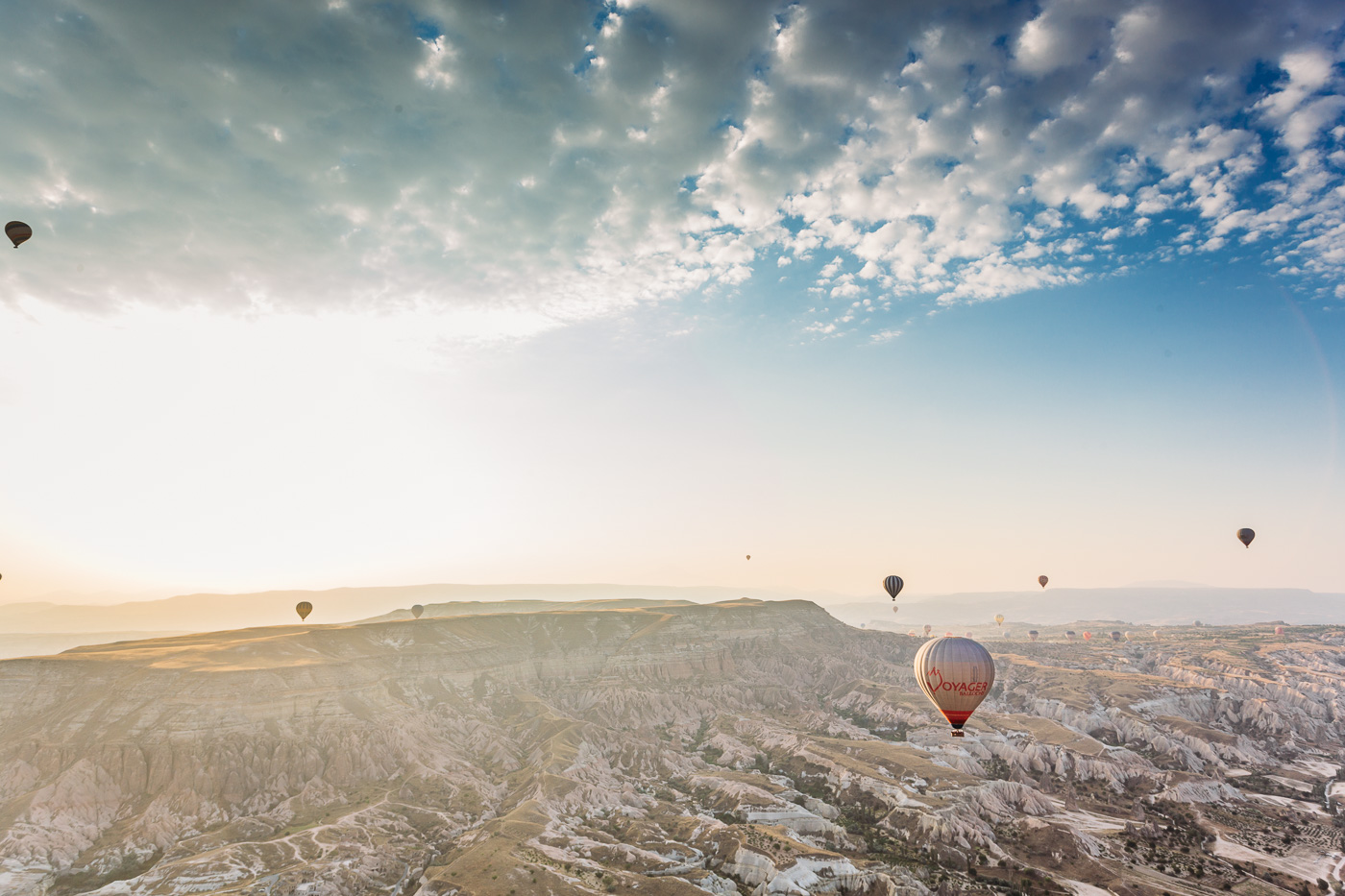 Amazing skies above and rocky landscapes below in our Cappadocia hot air balloon ride