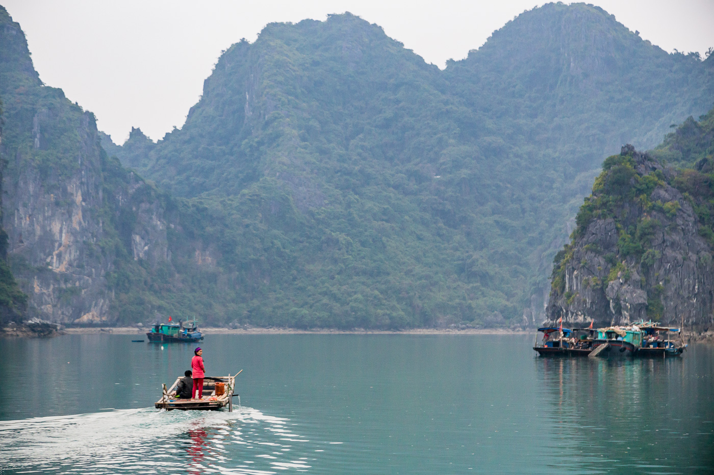 Our fishermen friends leave us after a day of fishing in Bai Tu Long Bay Halong Bay
