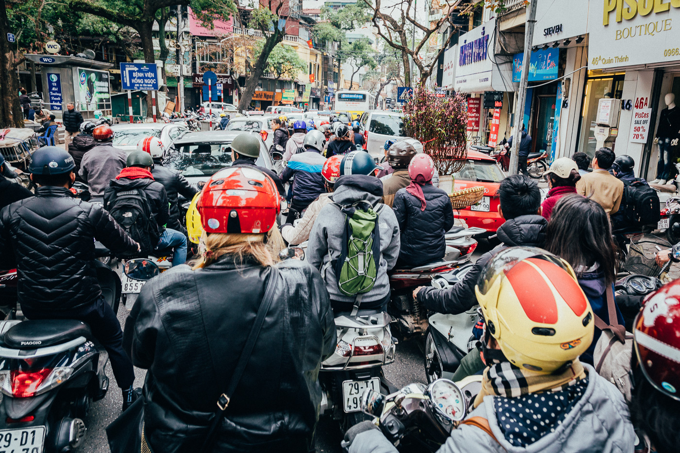 Lost in a sea of motorbikes on our Hanoi street food tour by motorbike