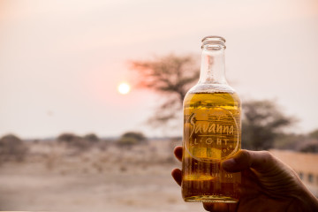 Watching the sun set over the savannah of Onguma Game Reserve outside of Etosha National Park