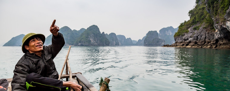 Our ride aboard a fishermen's boat exploring Bai Tu Long in Halong Bay