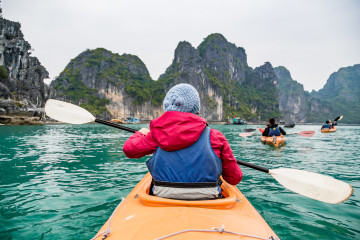 Taking a turn around Bai Tu Long on Halong Bay aboard kayaks